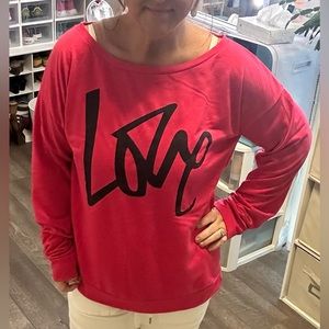 Hot pink off shoulder jersey.